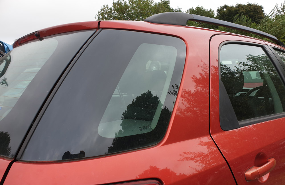 Suzuki SX4 GLX Quarter window glass driver side rear